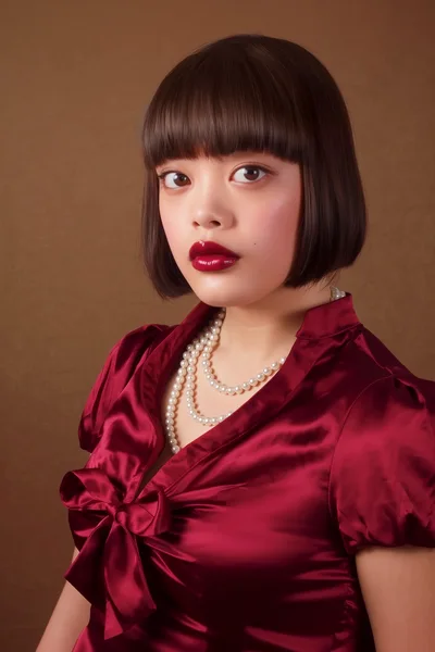 Portrait Of A Young Woman In Vintage Style
