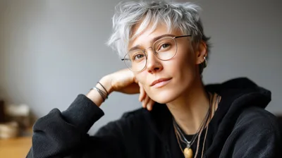 Portrait Of A Young Person With Short Silver Hair