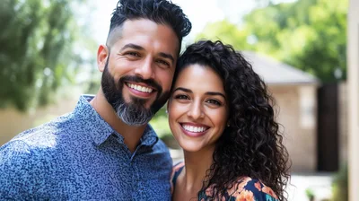 Happy Couple Smiling Together Outdoors