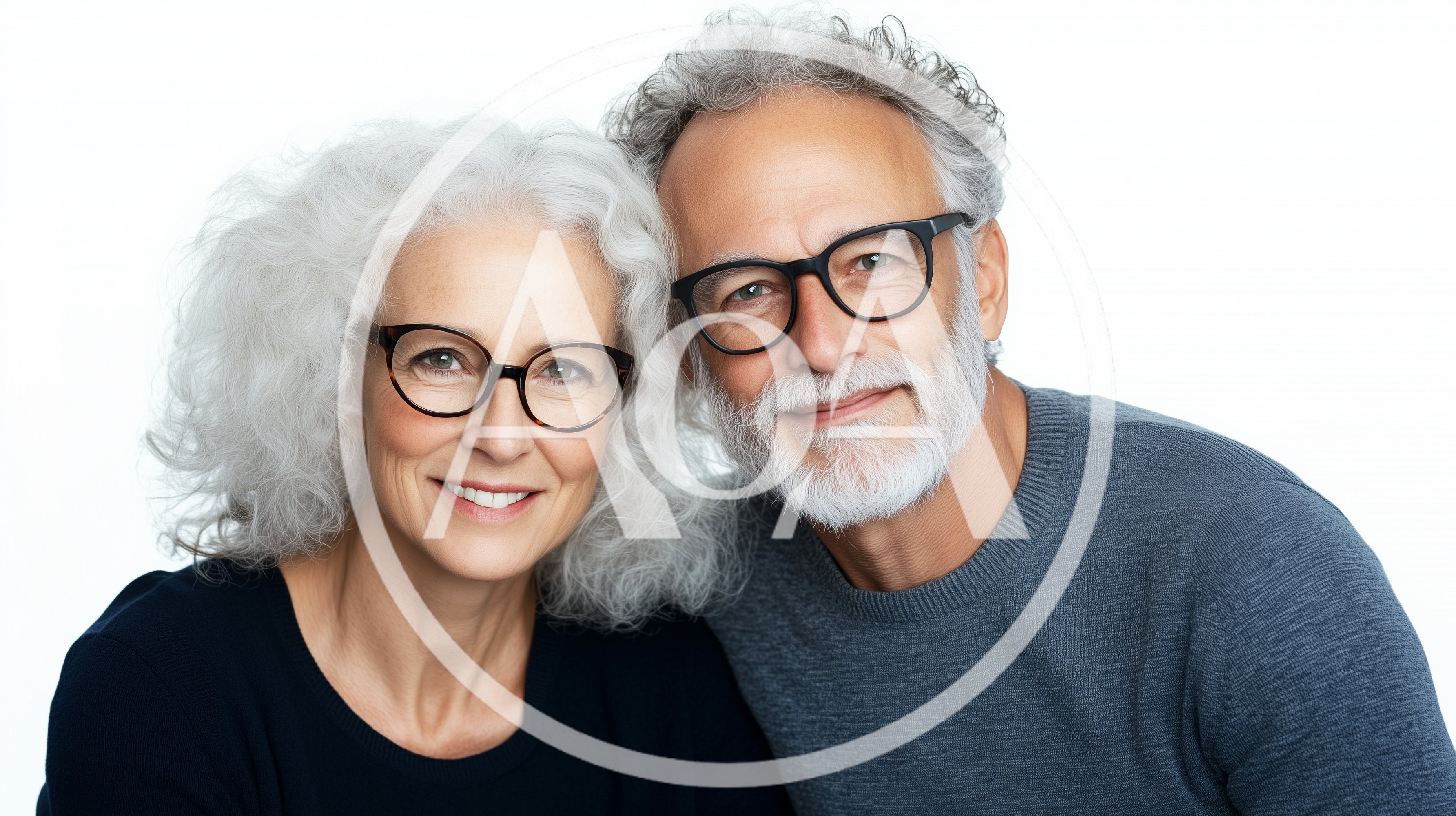 Portrait Of A Happy Senior Couple Wearing Glasses