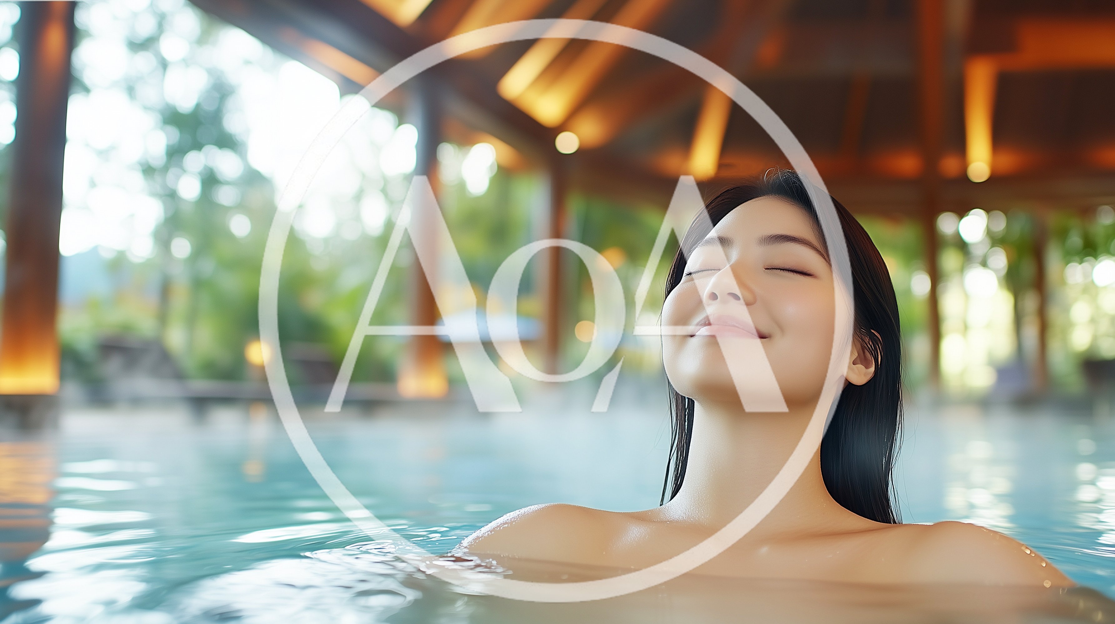 Young Asian Woman Relaxing In A Hot Spring
