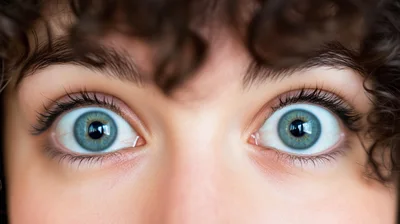 Close Up Of Wide Blue Eyes