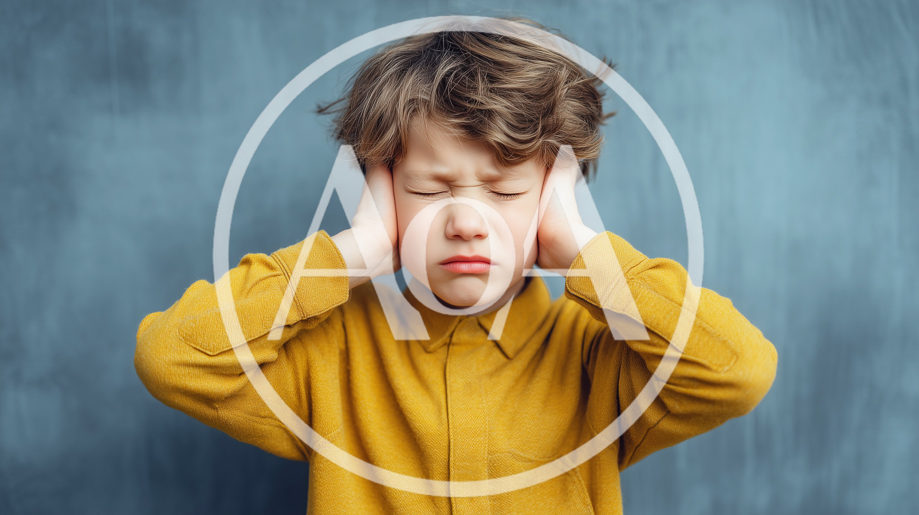 Young Boy Covering Ears With Hands