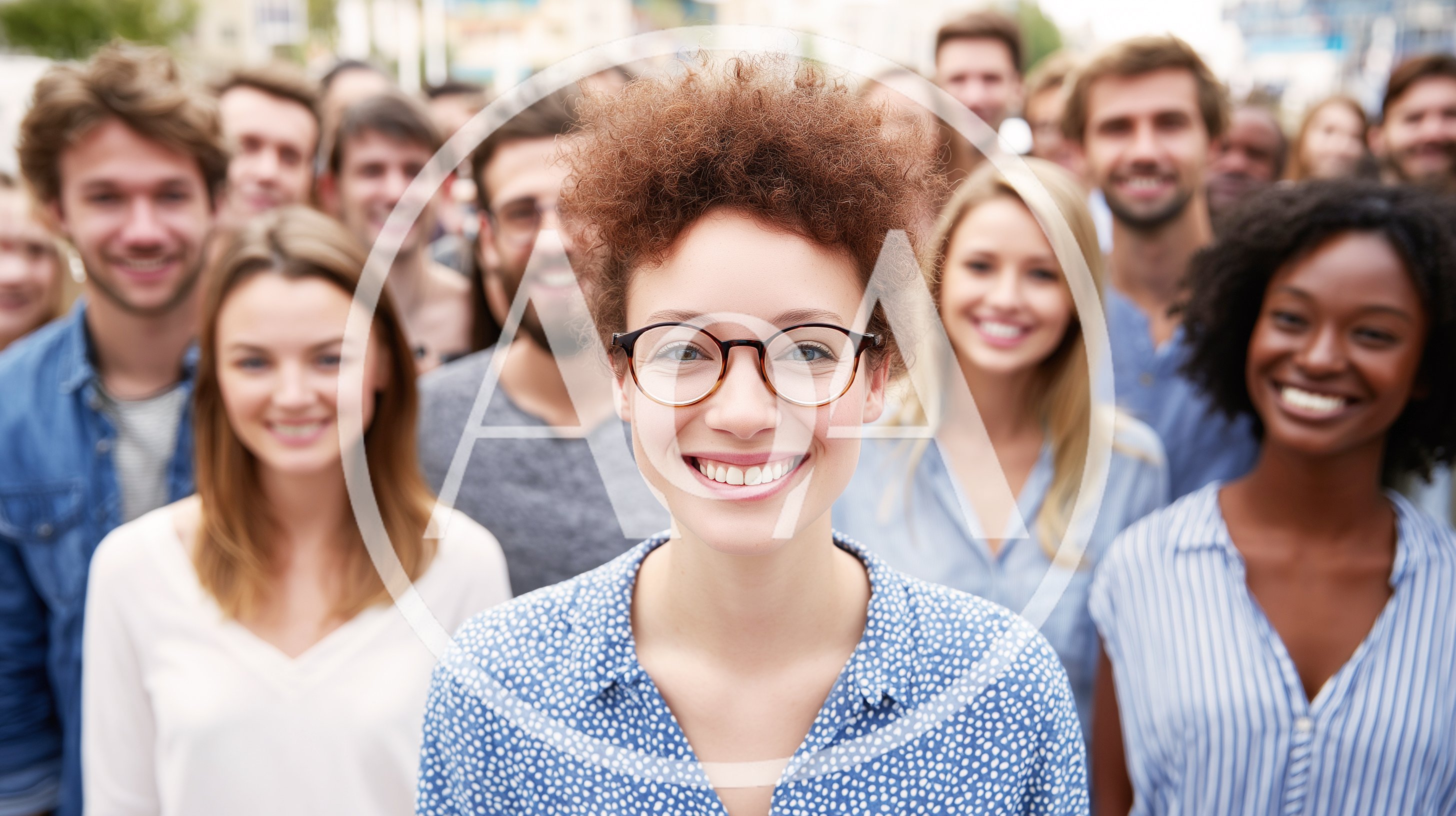 Diverse Group Of Smiling Young Professionals Outdoors