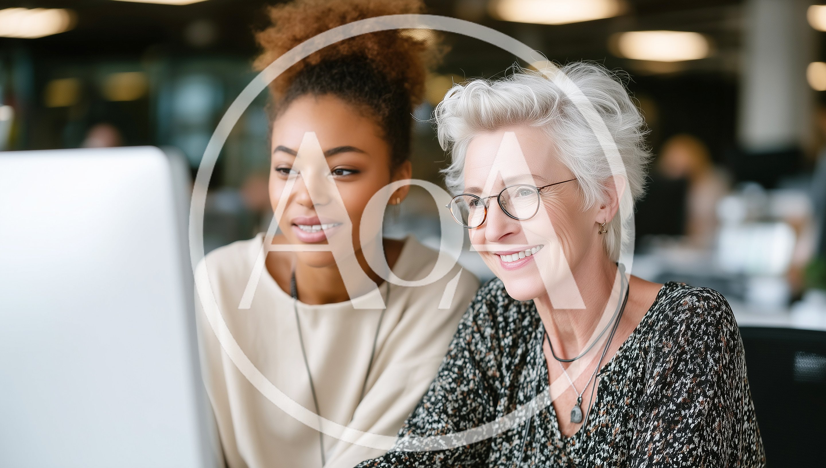 Diverse Female Colleagues Collaborating On A Computer