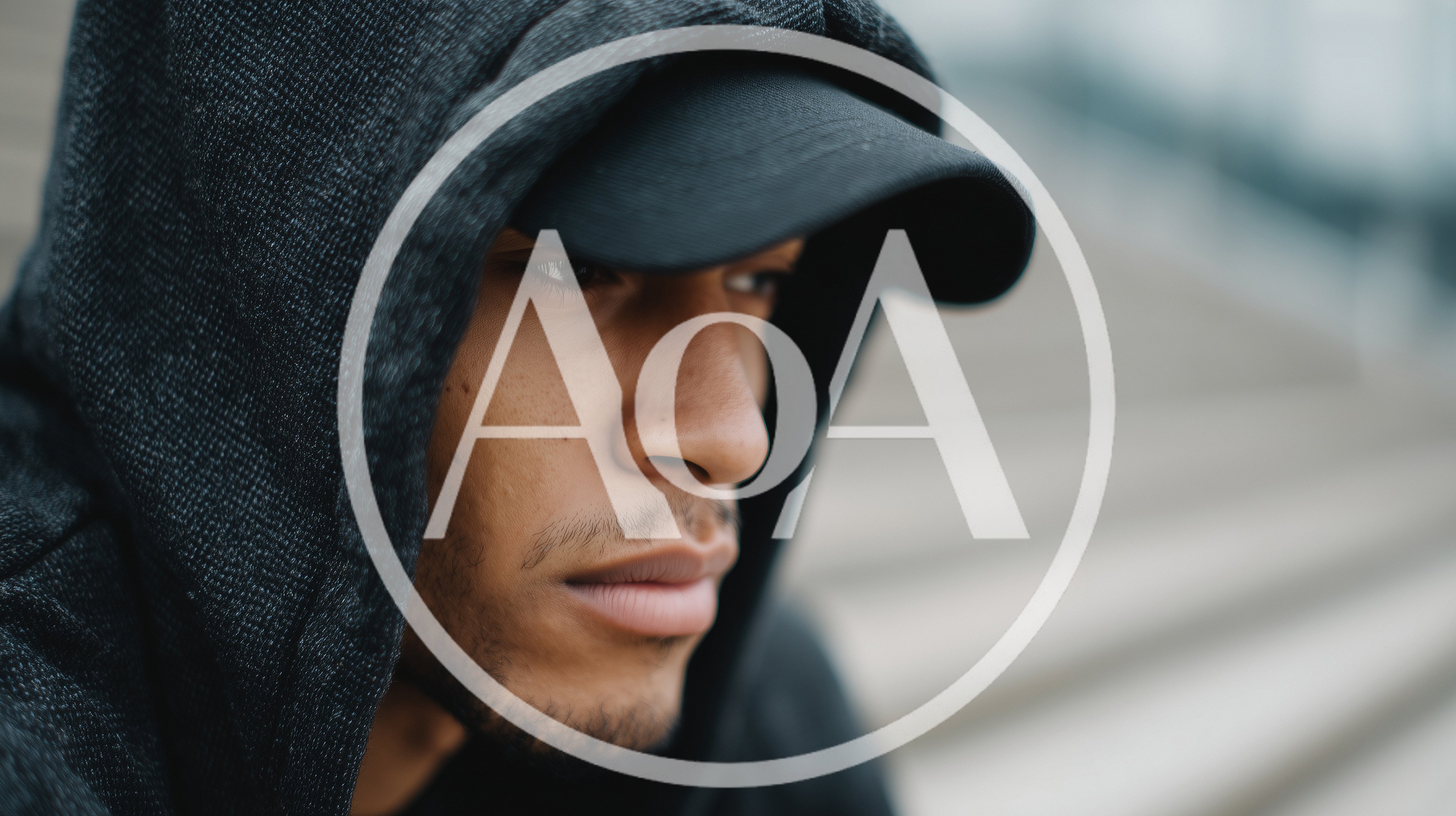 Close Up Portrait Of A Young Man In A Hoodie