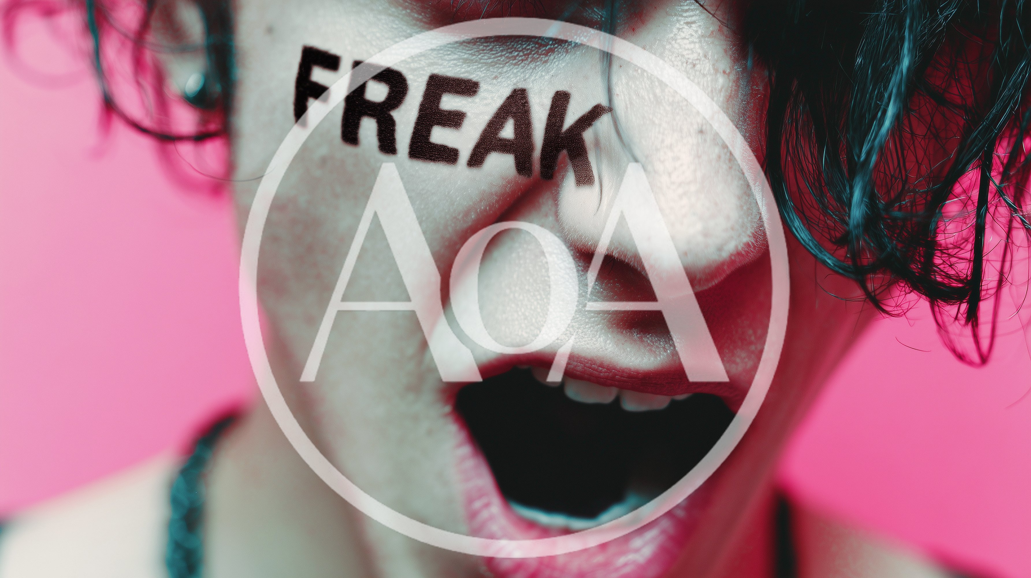 Close Up Of A Person Screaming With Freak Written On Face