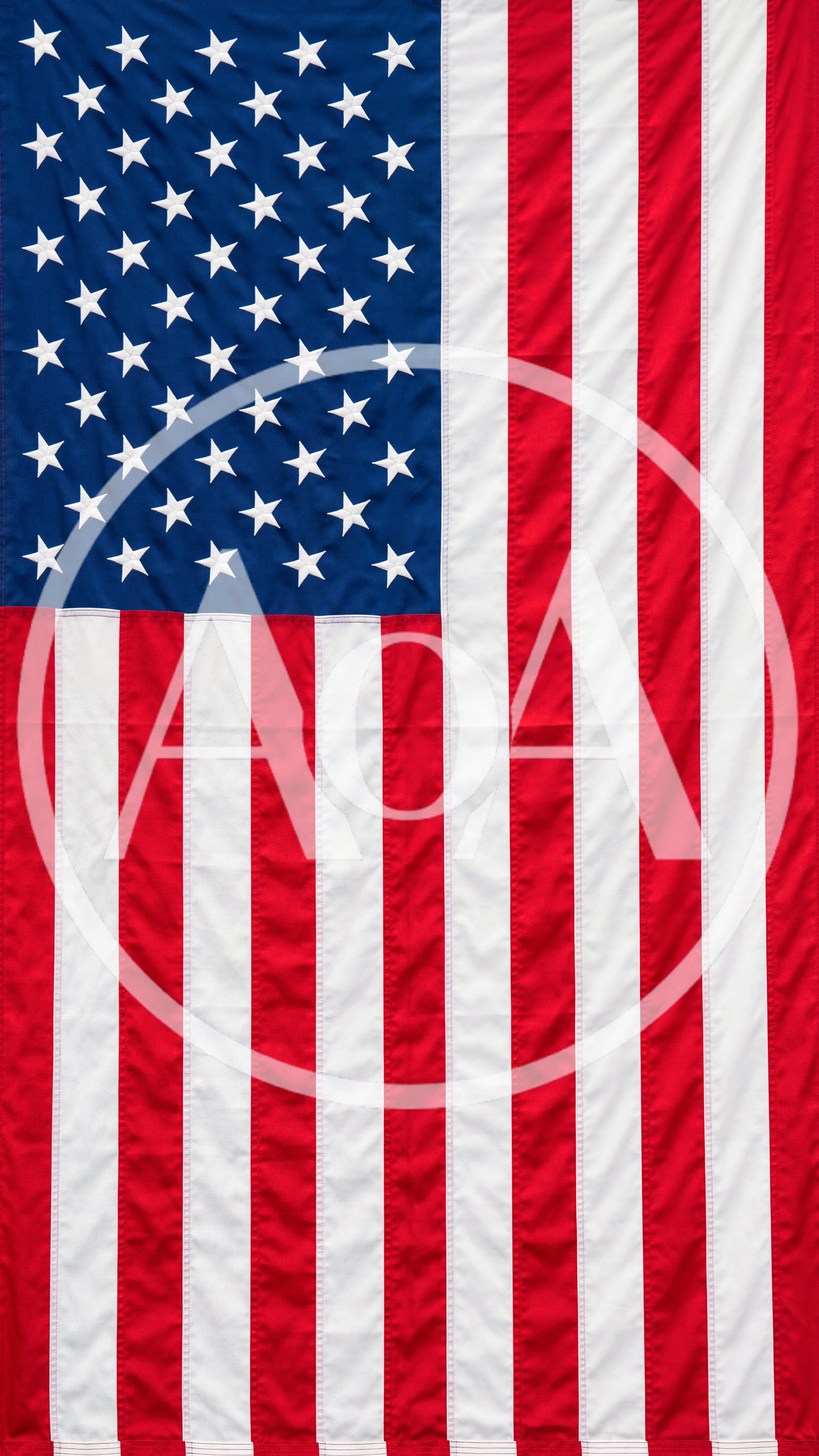 Vertical American Flag Hanging With Visible Fabric Texture