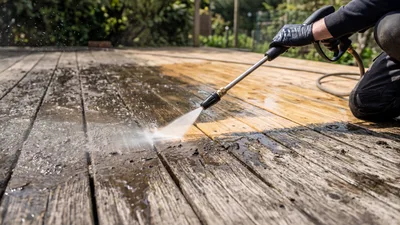 Pressure Washing Dirty Wooden Decking