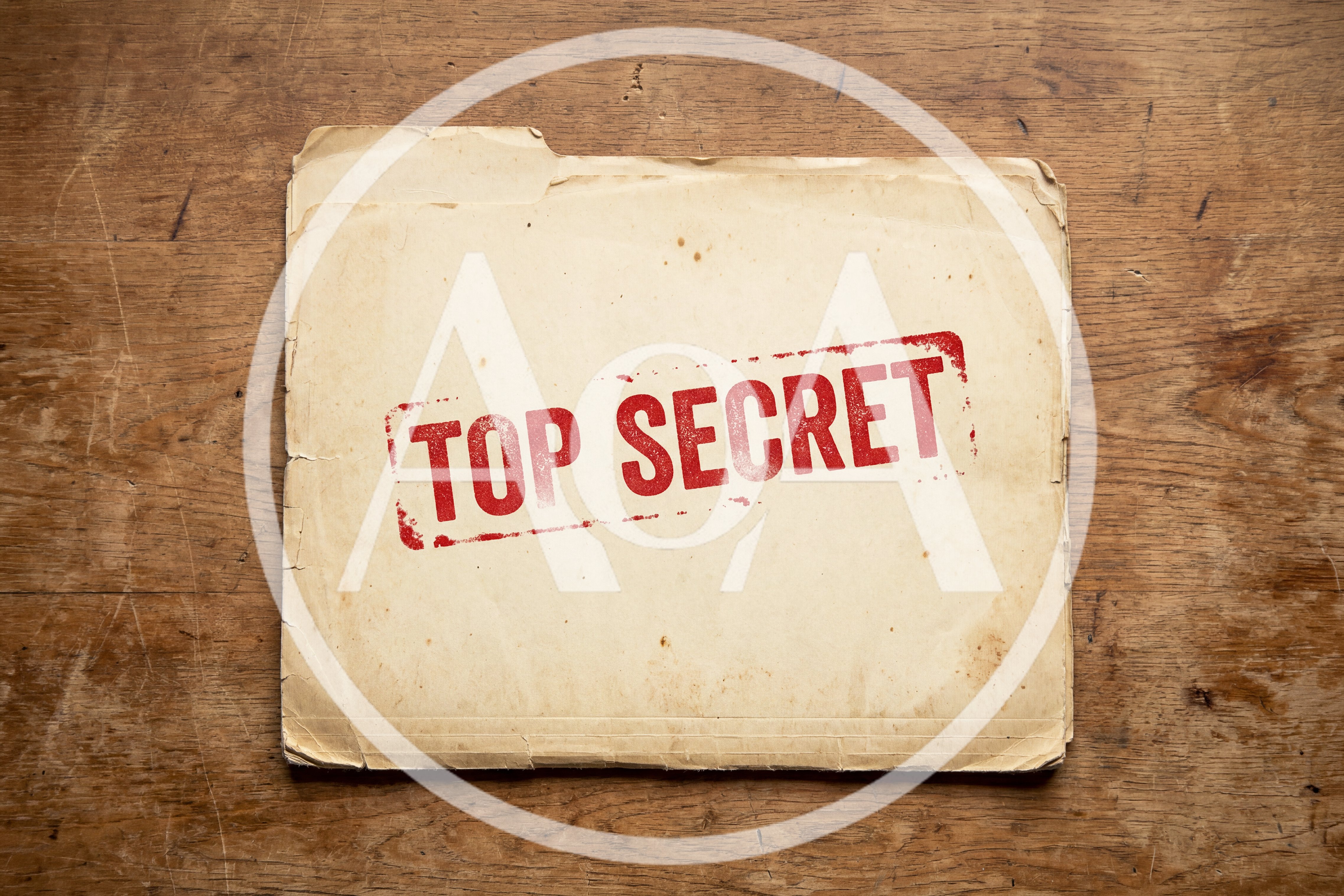 Top Secret File Folder On Wooden Desk