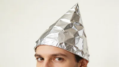 Man Wearing A Homemade Tin Foil Hat