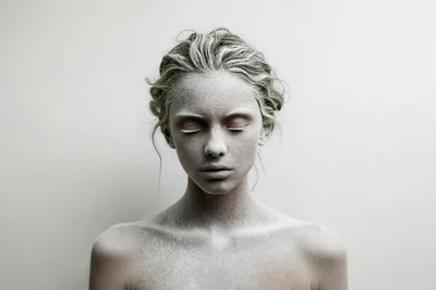 Portrait Of A Woman Covered In White Powder