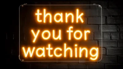 Neon Thank You For Watching Sign On Brick Wall