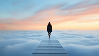 Woman Walking On A Wooden Bridge Above Clouds