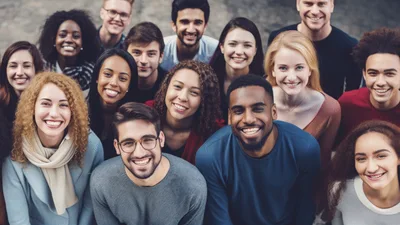 Diverse Group Of Young Adults Smiling Together