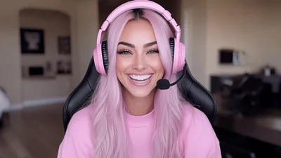 Young Woman With Pink Hair Wearing Gaming Headset
