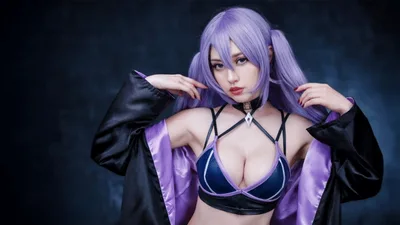 Cosplayer Dressed As Anime Character With Purple Hair