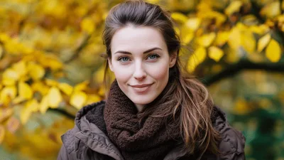 Portrait Of A Young Woman In Autumn Forest