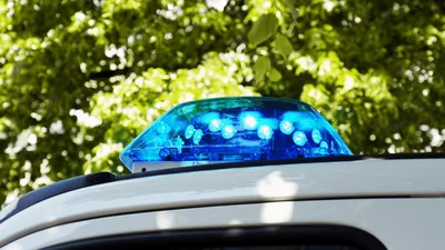 Blue Emergency Light Bar On Police Vehicle Roof