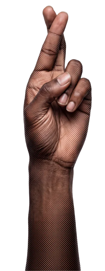 Close Up Of A Black Hand With Crossed Fingers
