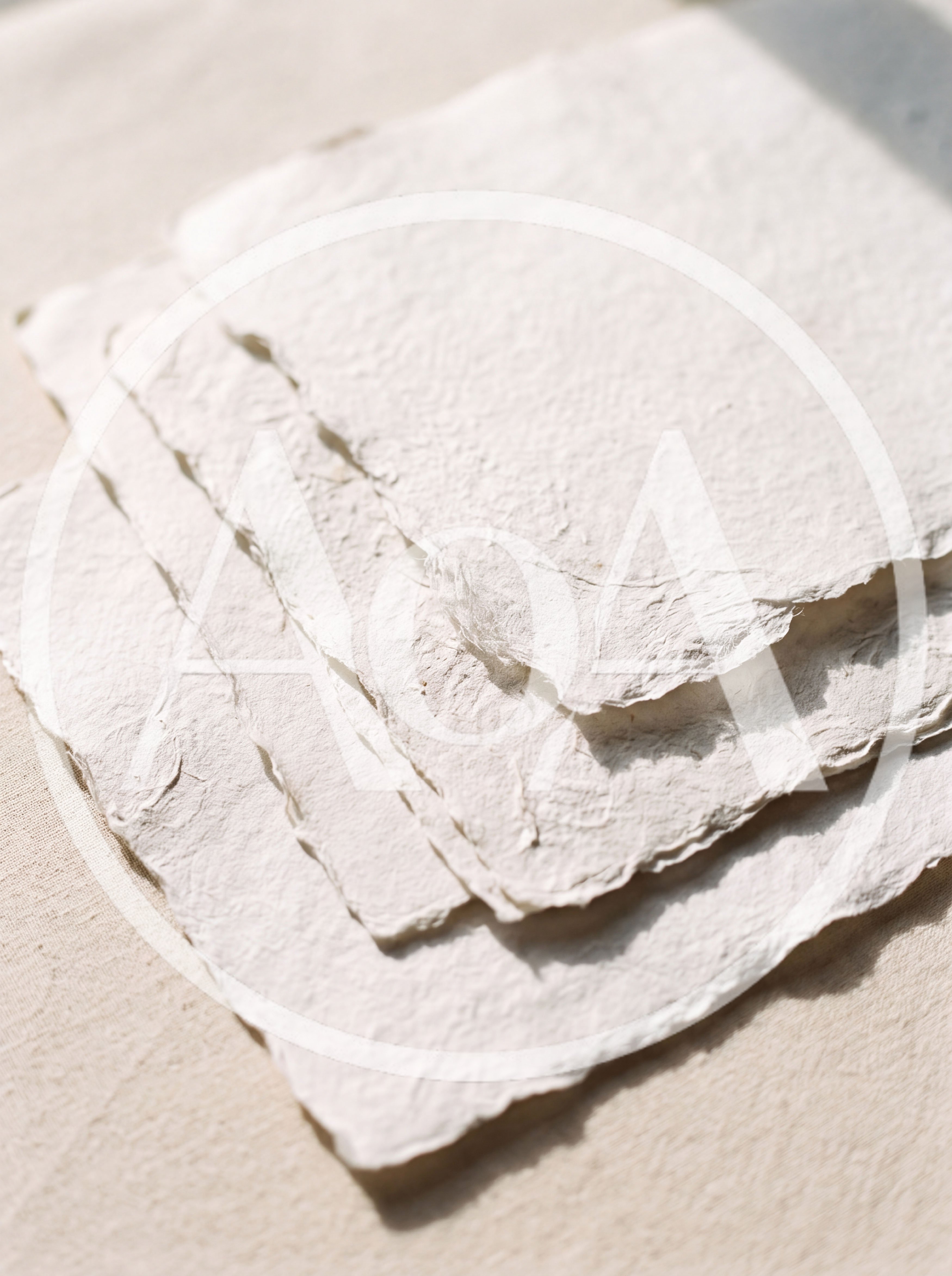 Stack of Handmade Textured Paper Sheets