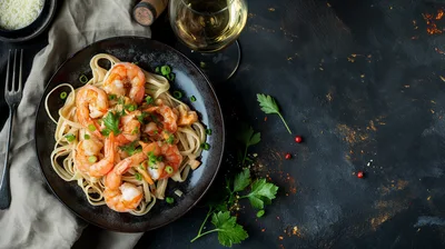 Shrimp Scampi Pasta Dish on Dark Table