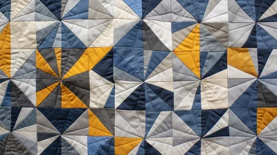 Geometric Quilt Pattern With Blue And Yellow Fabric