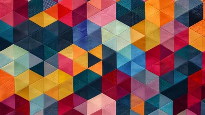 Colorful Geometric Quilt Pattern With Hexagonal Fabric Pieces