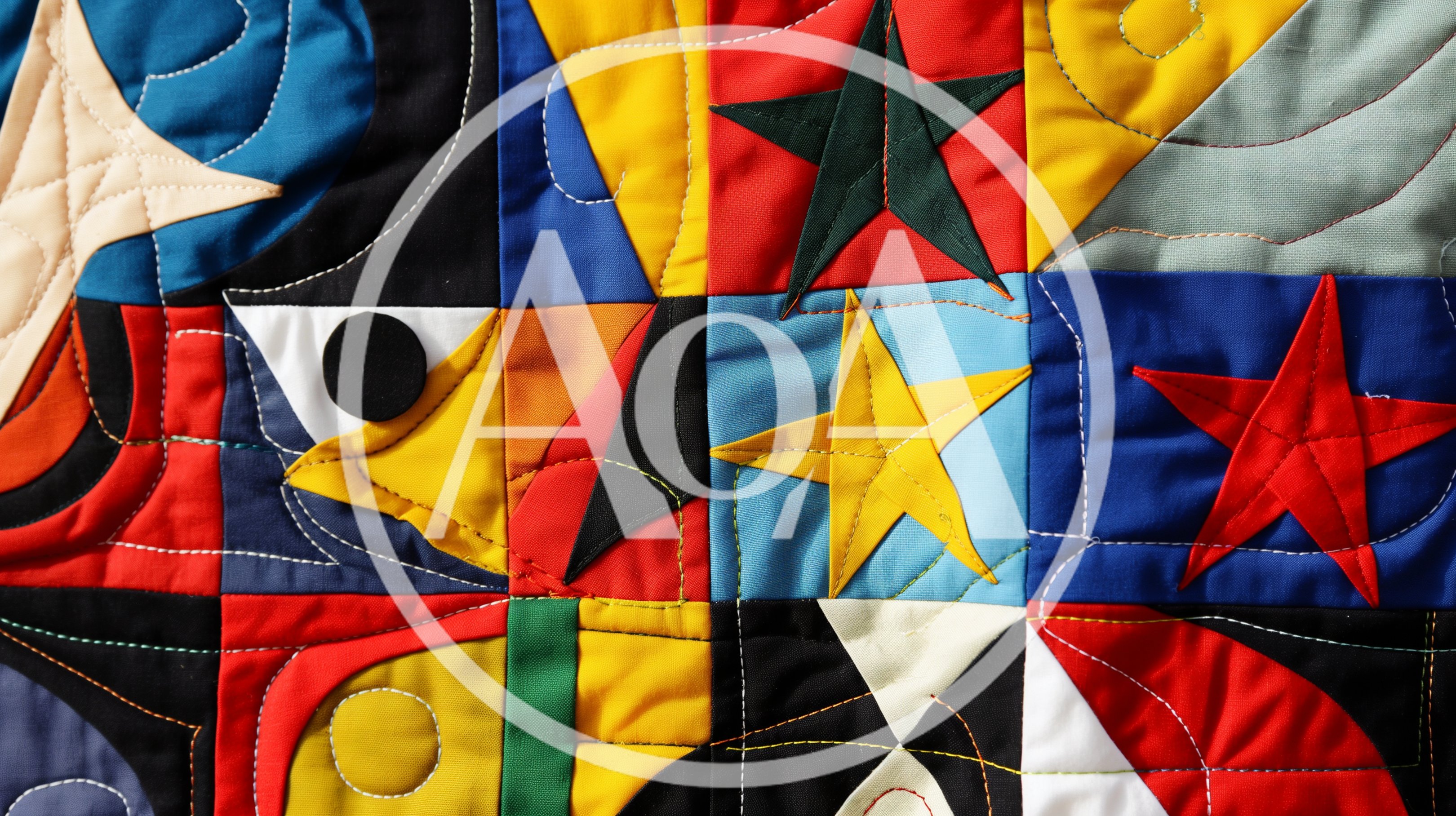 Colorful Geometric Quilt With Star Patterns