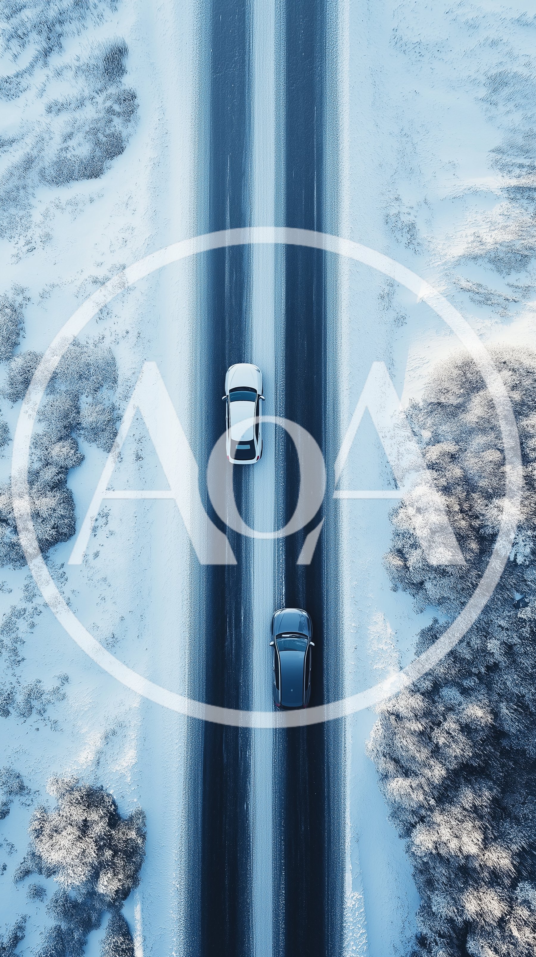Aerial View Of Two Cars Driving On Snowy Road