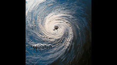 Satellite View Of A Massive Rotating Hurricane Over Ocean