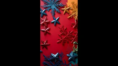Christmas Ornaments Arranging Themselves On Red Background