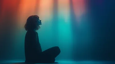 Woman Sitting In Meditation With Cinematic Lighting