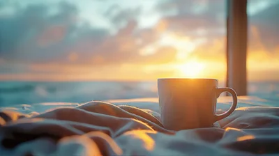 Coffee Mug Resting On Bedding At Sunrise