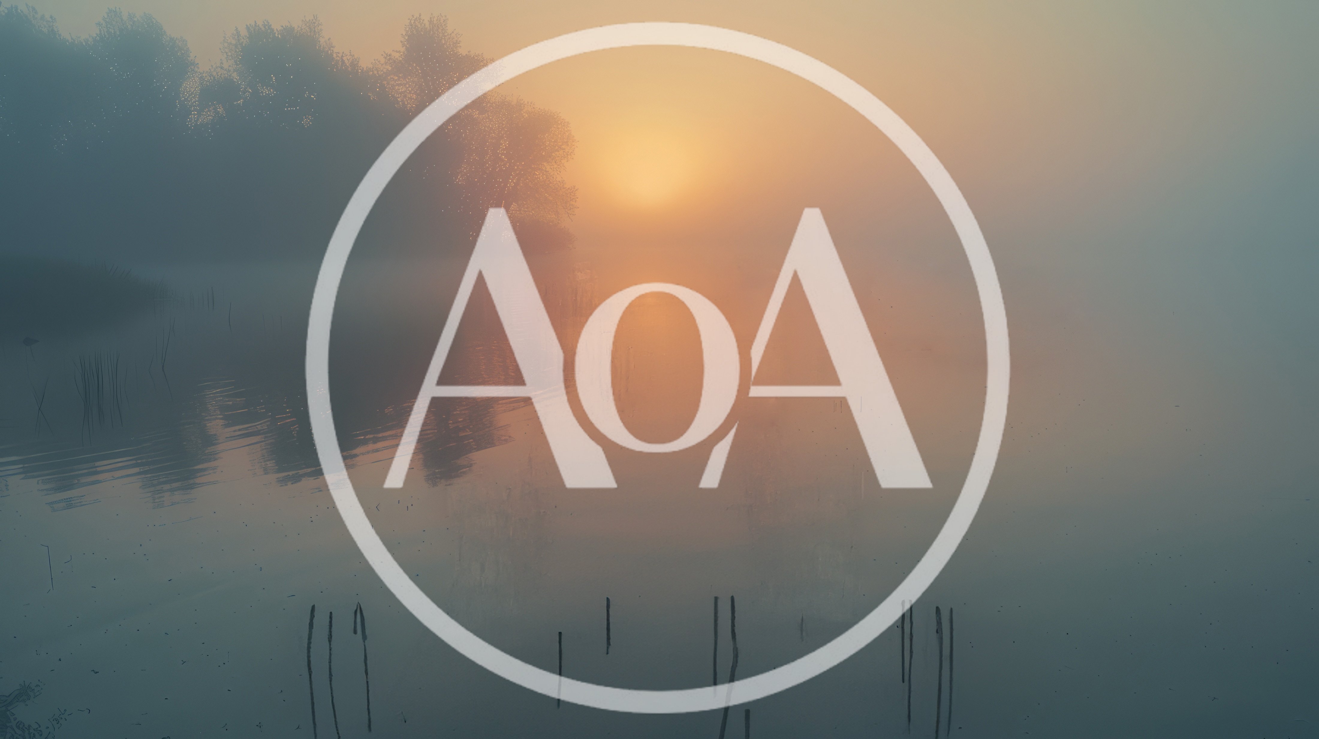 Serene Sunrise Over A Foggy Lake