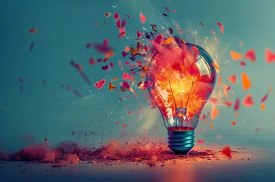 Exploding Light Bulb With Vibrant Colorful Particles