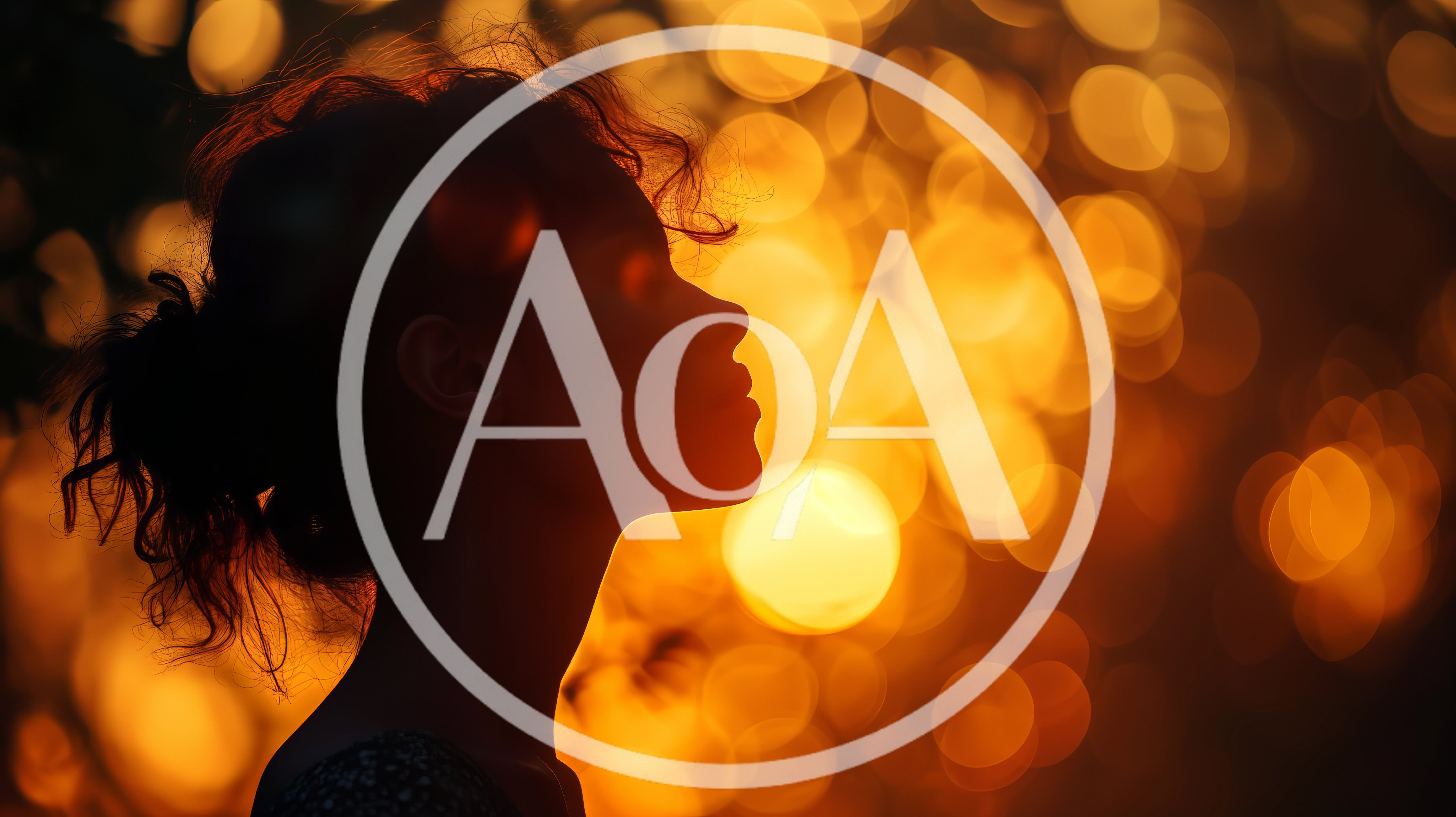 Silhouette Of A Woman Against Golden Bokeh Background