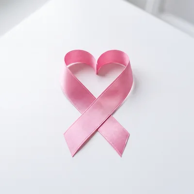 Pink Ribbon Formed Into A Heart Shape