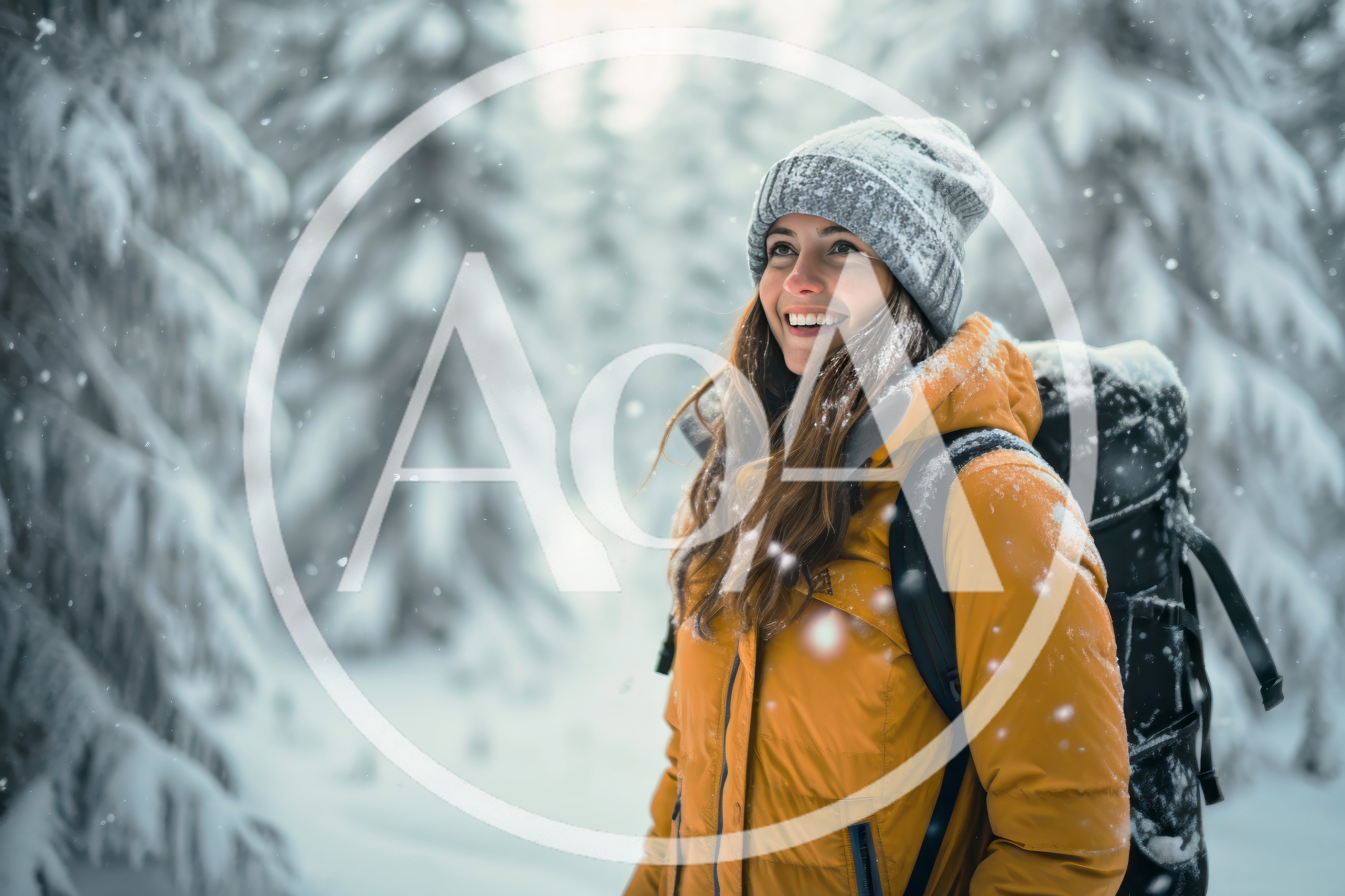 Young Woman Hiking Through Snowy Winter Forest