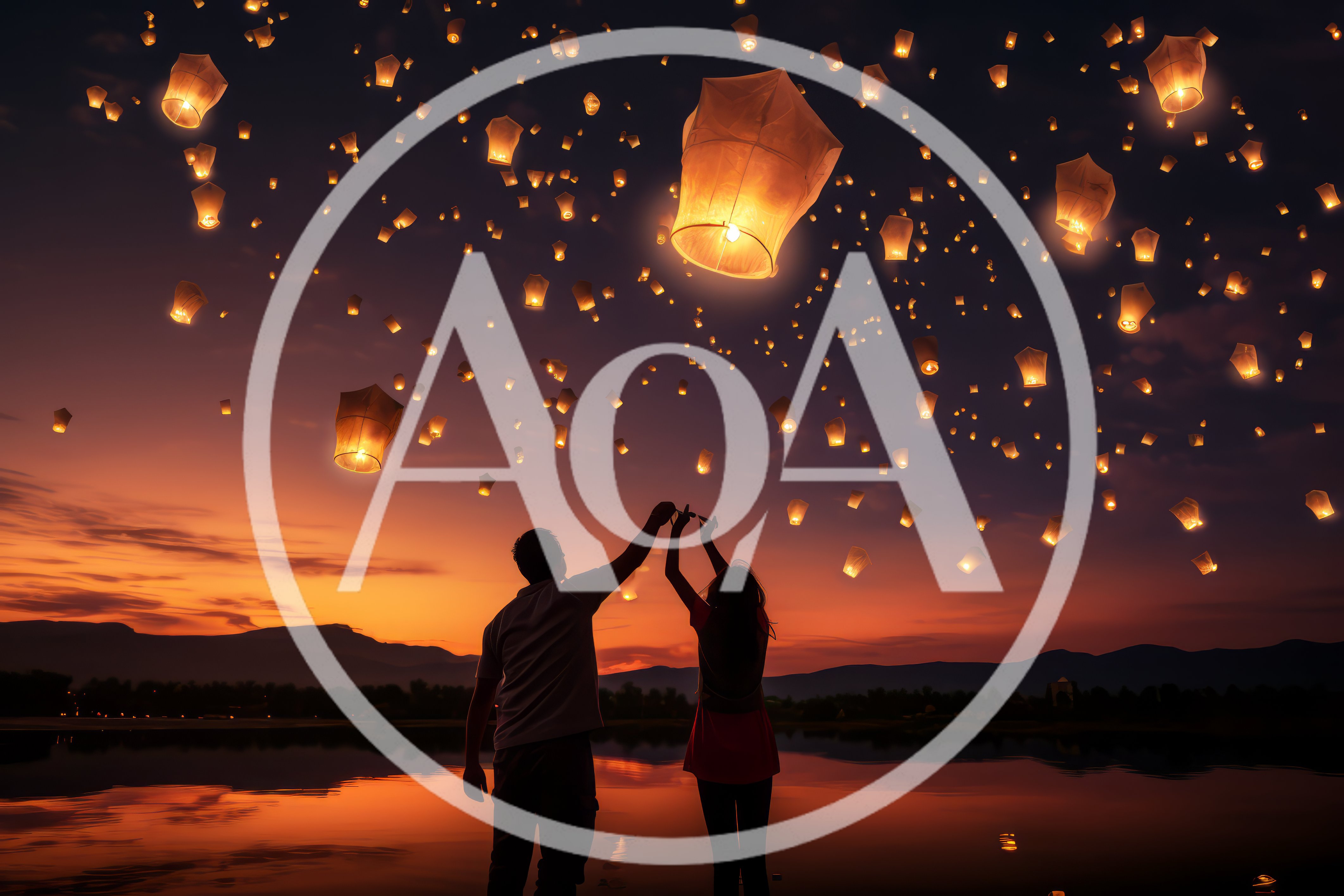 Couple Releasing Sky Lanterns Over A Lake At Sunset