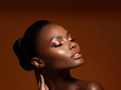 Portrait Of A Beautiful Woman With Glowing Makeup
