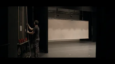 Stage Technician Operating Counterweight System In Theater