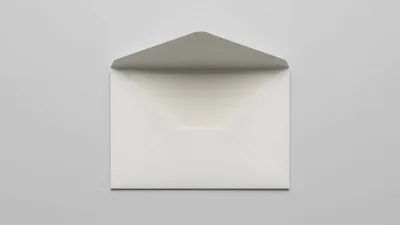 White Envelope Opening Against A Neutral Gray Background