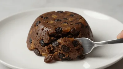 Fork Taking A Bite Of Christmas Pudding