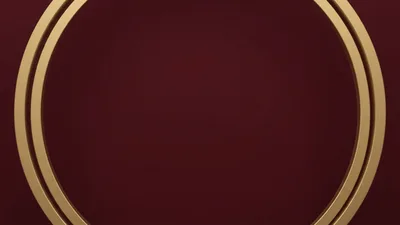 Two Golden Rings Rotating On A Dark Red Background