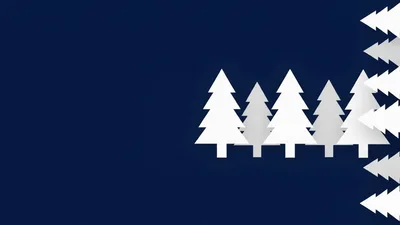 White Paper Christmas Trees Moving Across Dark Blue Background