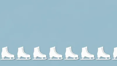 White Ice Skates Moving In A Row