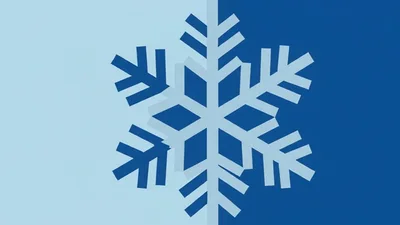 Paper Snowflake Moving Across Blue Background