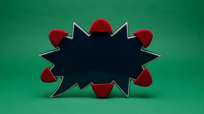 Red Semi Circle Magnets Attaching To Comic Speech Bubble