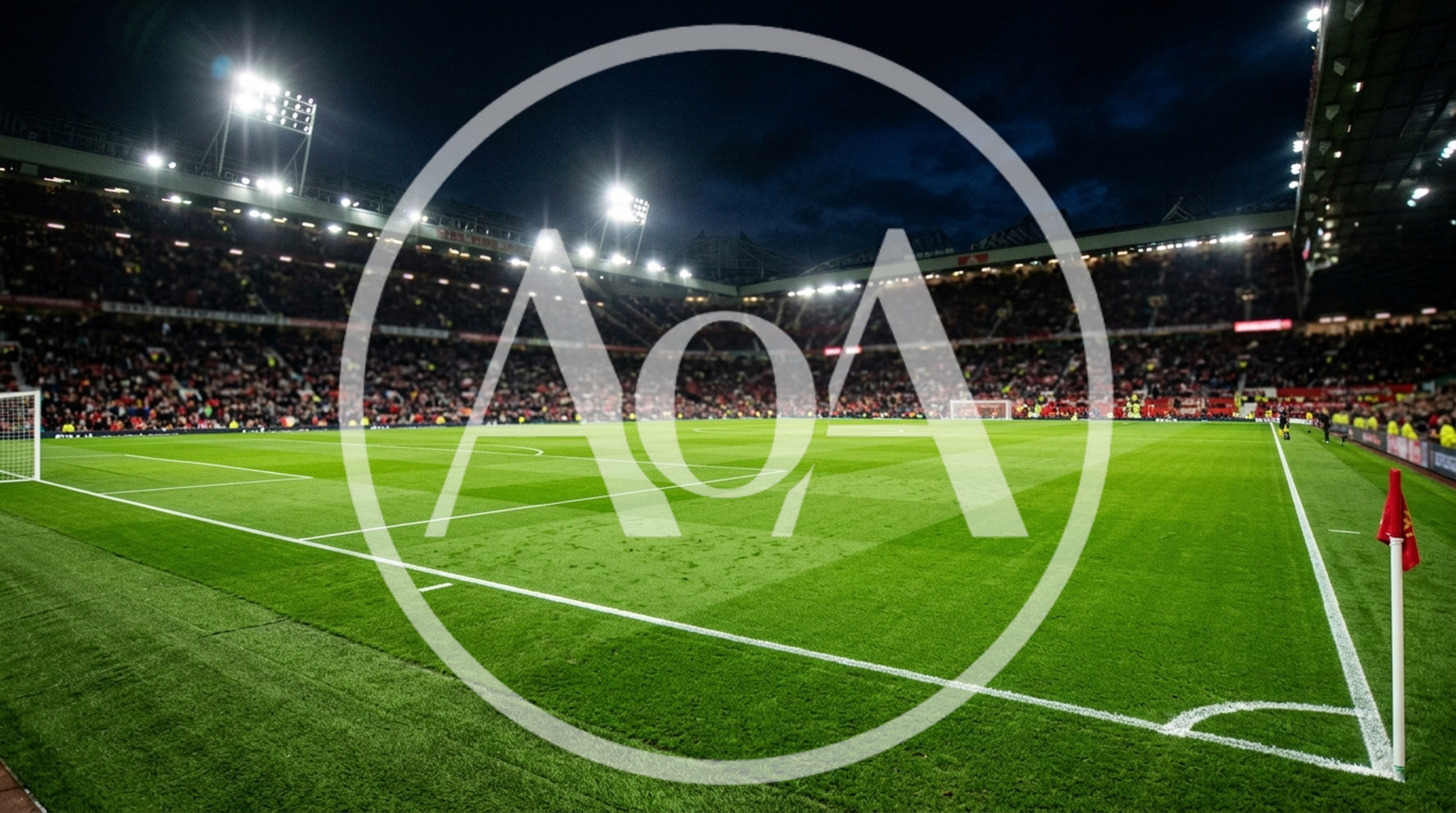 Empty Football Pitch At Old Trafford Stadium At Night